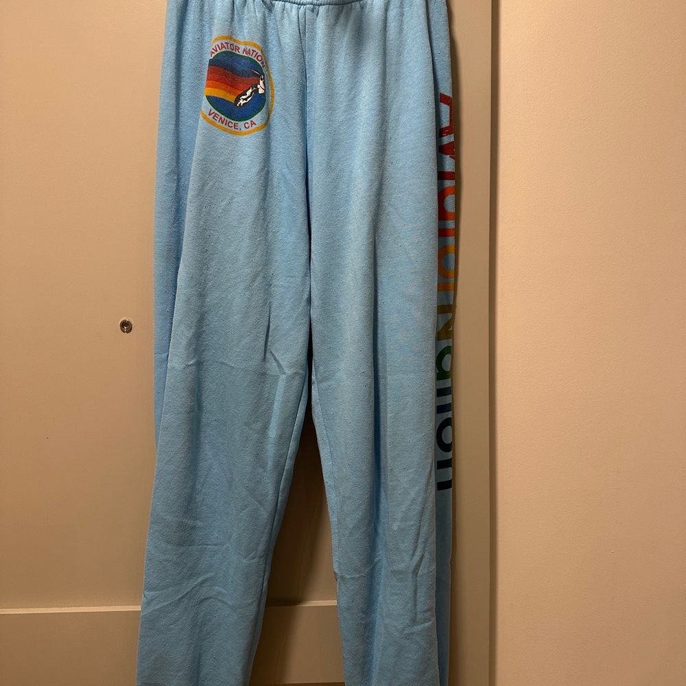 Light Blue Sweatpants with Rainbow Text
